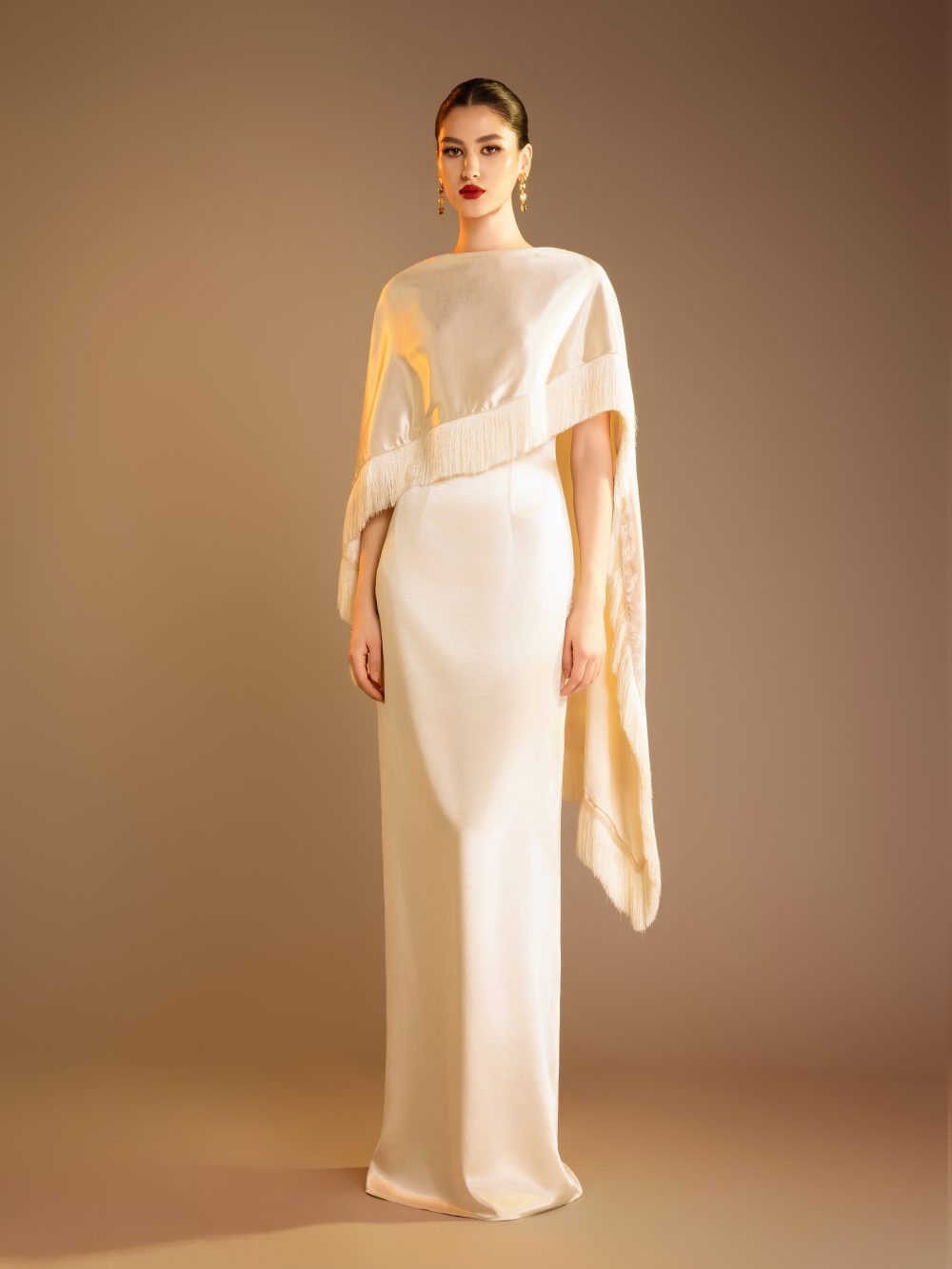 Column Gown With Fringed Trim Cape